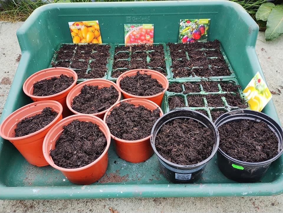 click to see larger image making raised beds and bird feeders at the newbold community growing together community garden