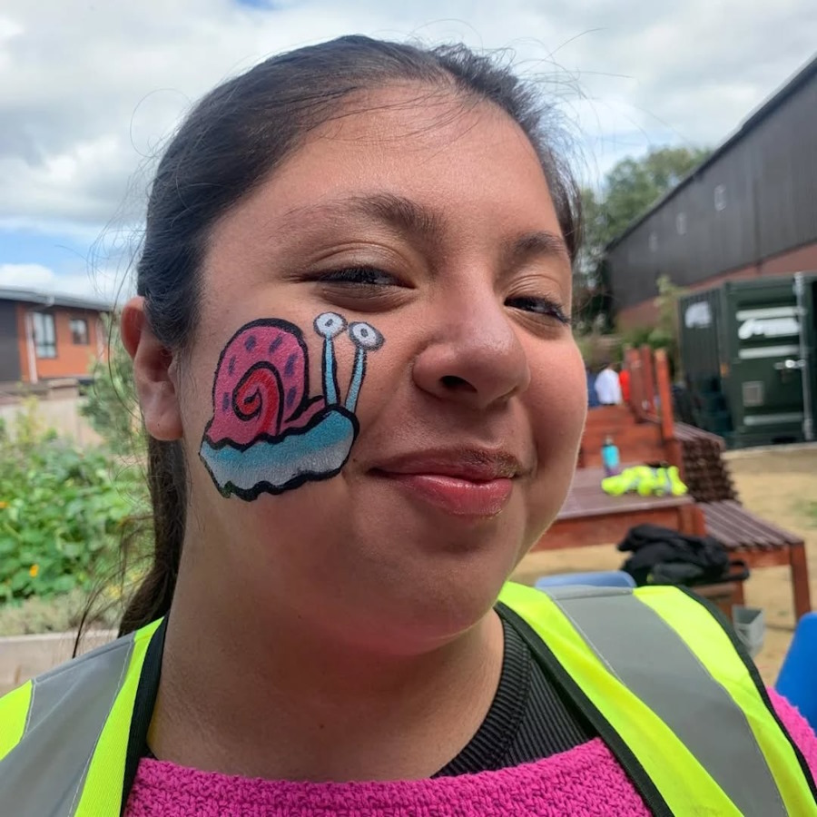 click to see more images face painting in the community garden