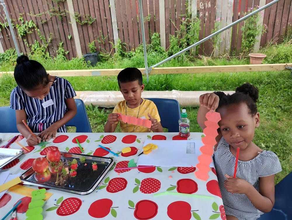 click to see larger image lovely day in the community garden
