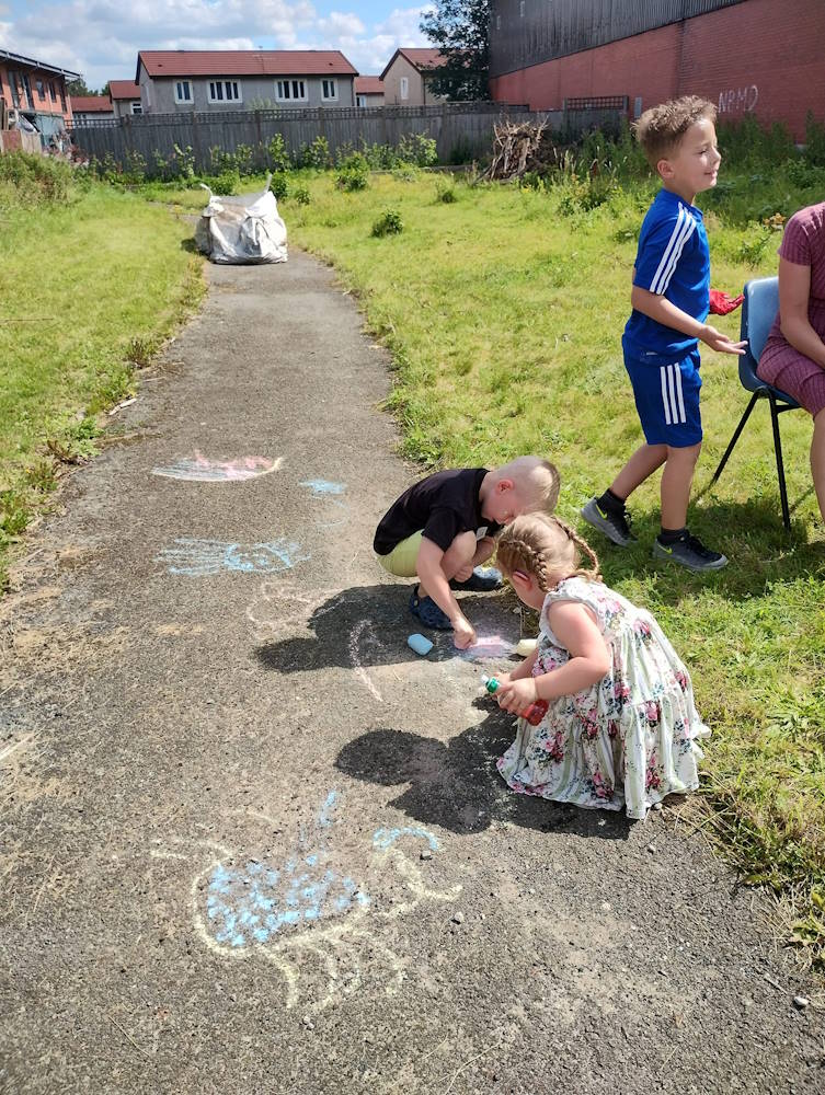 click to see larger image lovely day in the the community garden