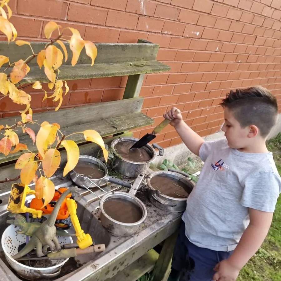 click to see larger image more barrowing of compost in the community garden