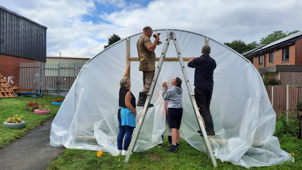click to see larger image the polytunnel ongoing